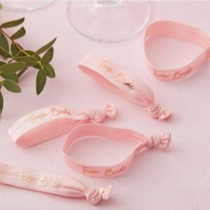 Pack de 5 pulseras. Team Bride. 10x2cm. Color rosa.