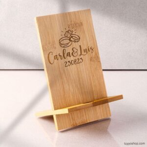 Ultimos regalos para invitados añadidos soporte movil personalizado boda alianzas